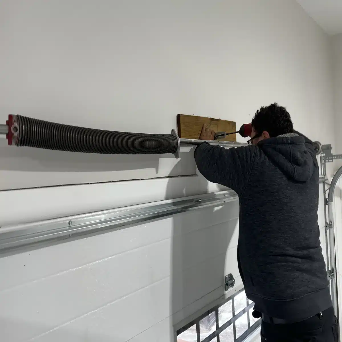 Garage door spring repair in Barrie by an ADR technician