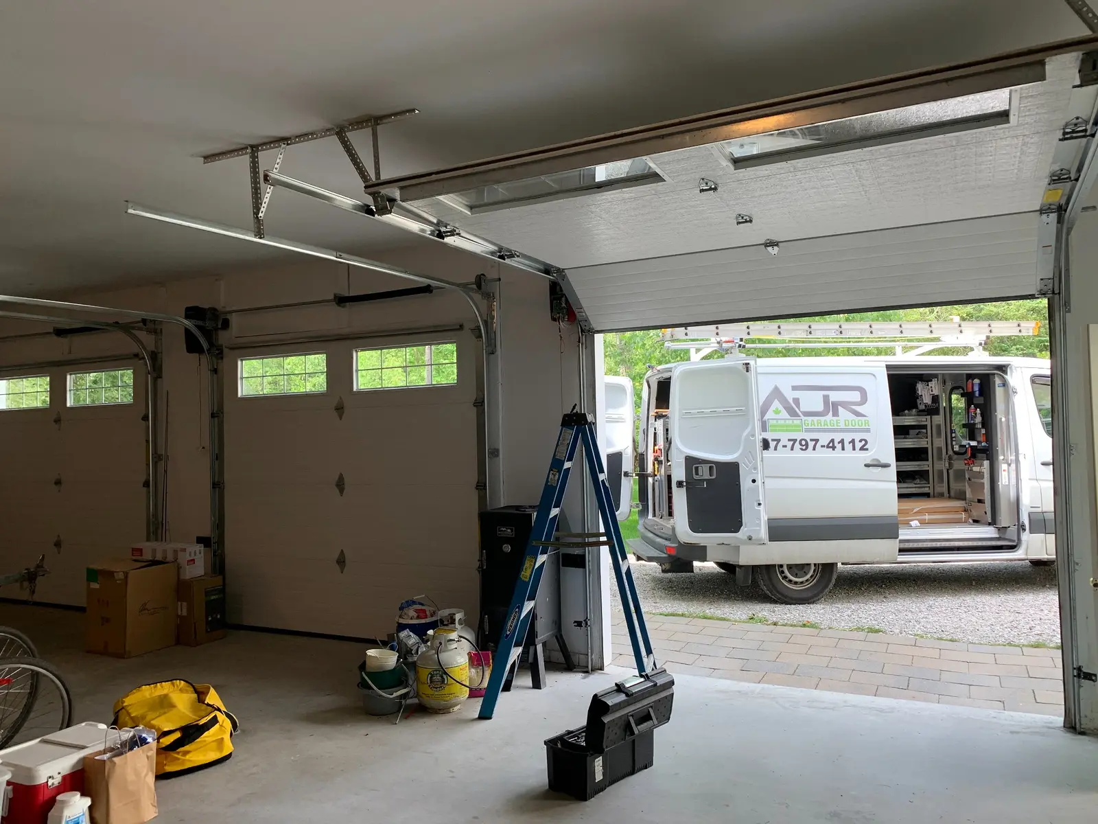 ADR van and service equipment ADR service van and equipment prepared for a residential garage door repair